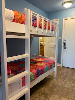 THE BUNK AREA RESIDES IN THE COMMON SPACE, HALLWAY