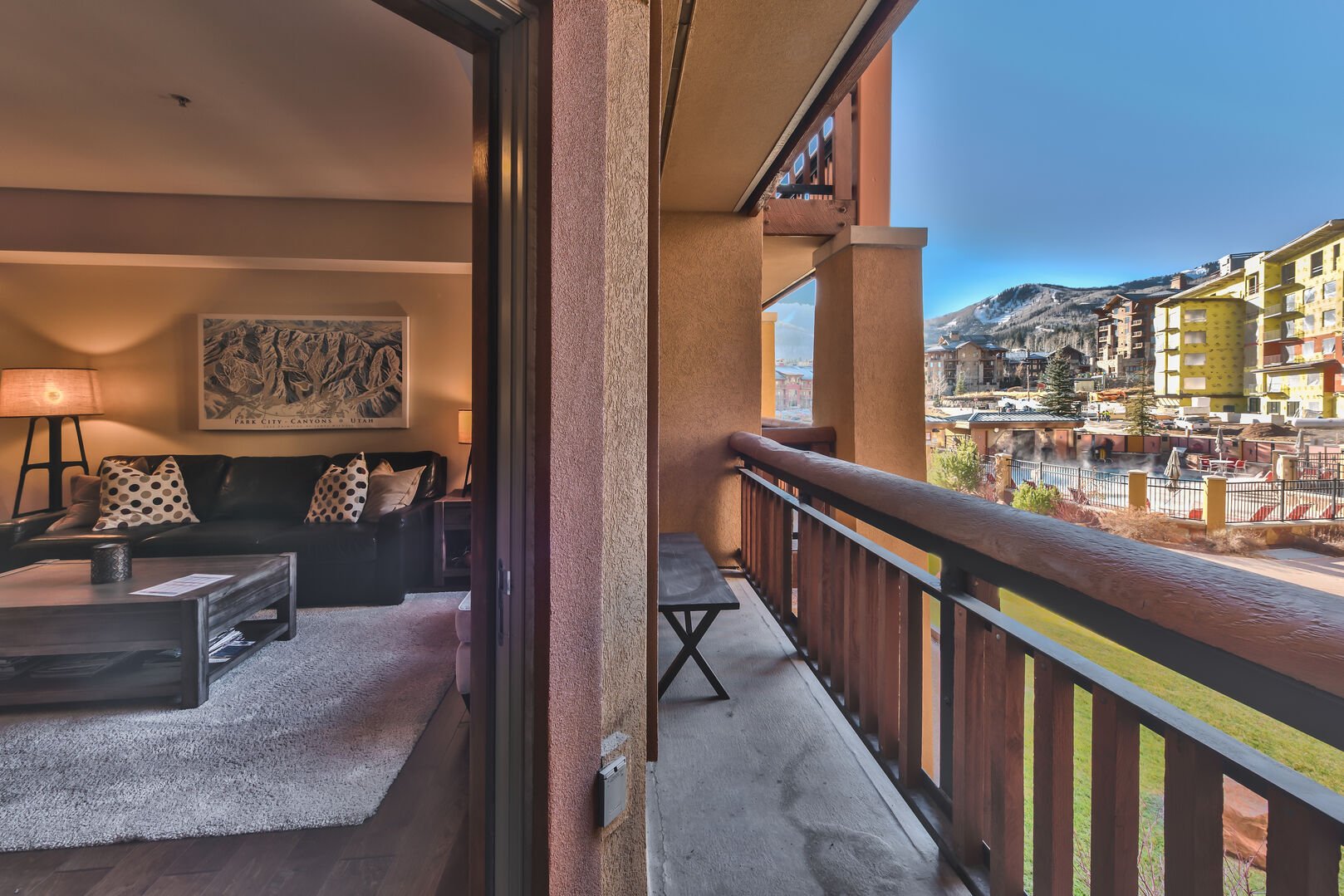 Balcony with view of pool and mountain