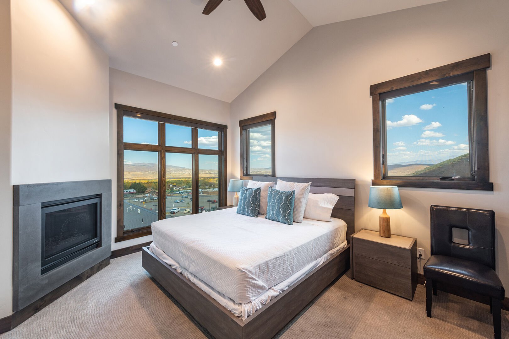 Master bedroom has king bed, fireplace, and a view of the lift