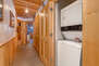 Stackable washer/dryer unit in hallway closet