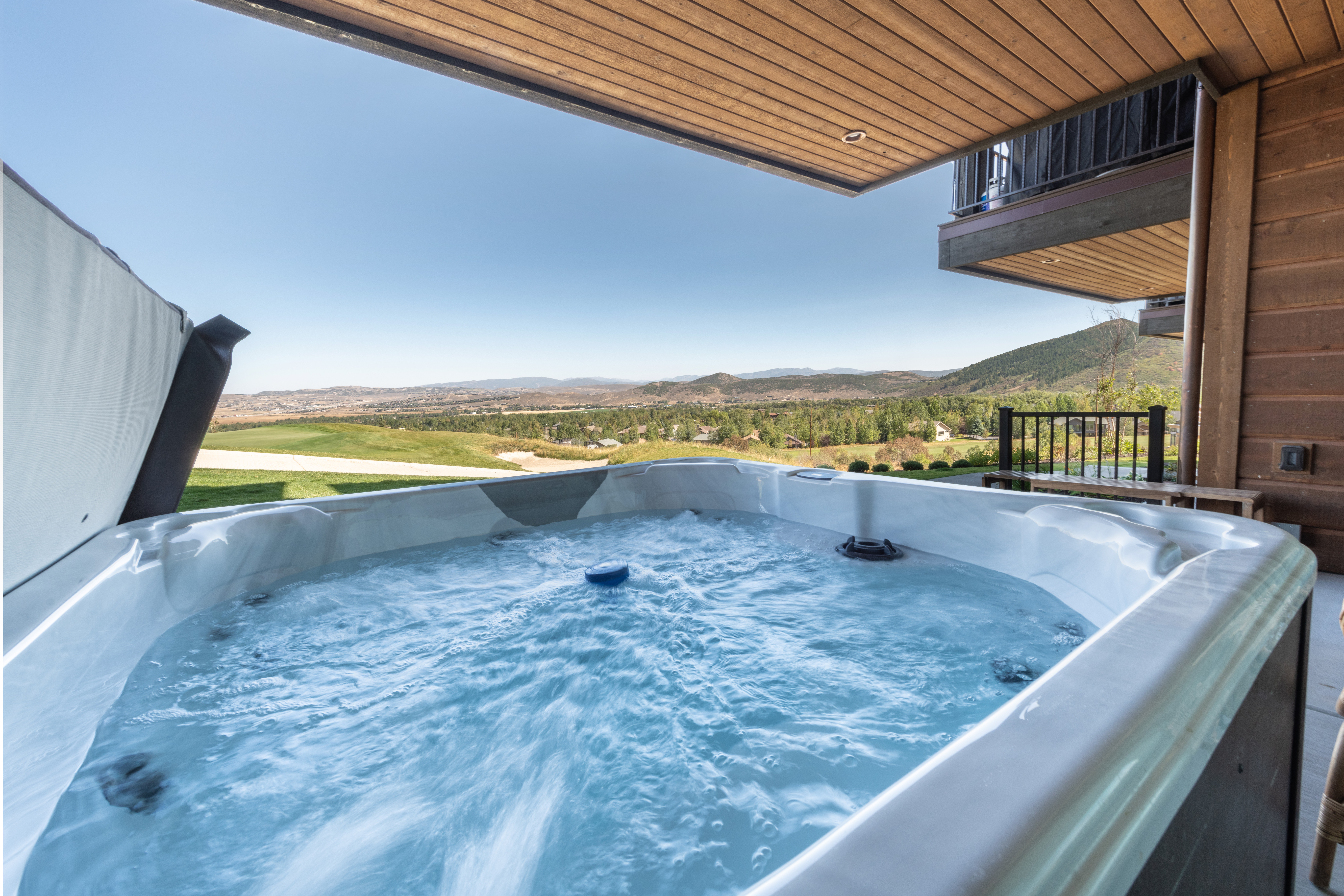 Private oversized hot tub with views of the golf course and valley