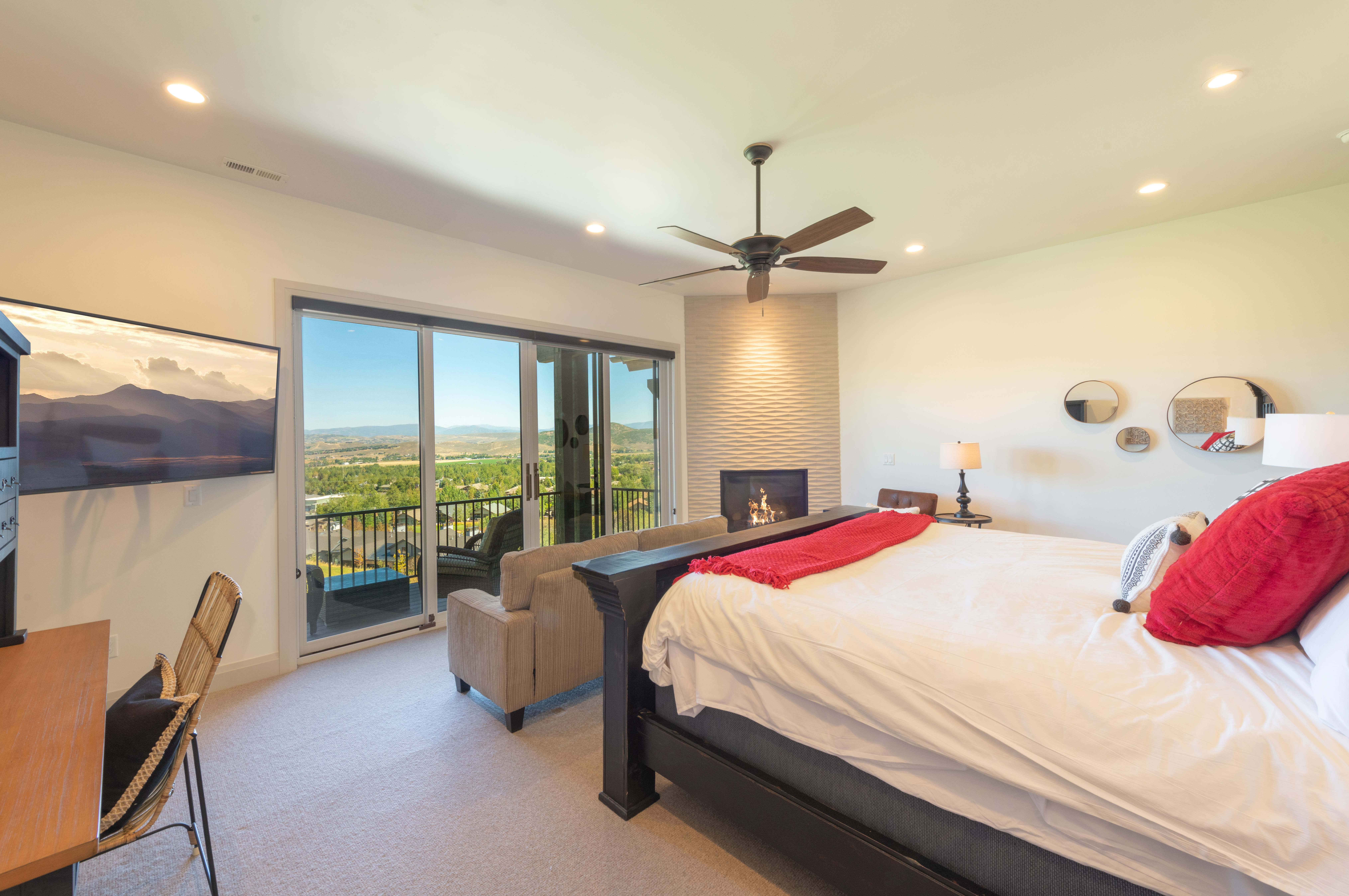 Master bedroom has king bed, fireplace, private balcony, views of golf course and valley