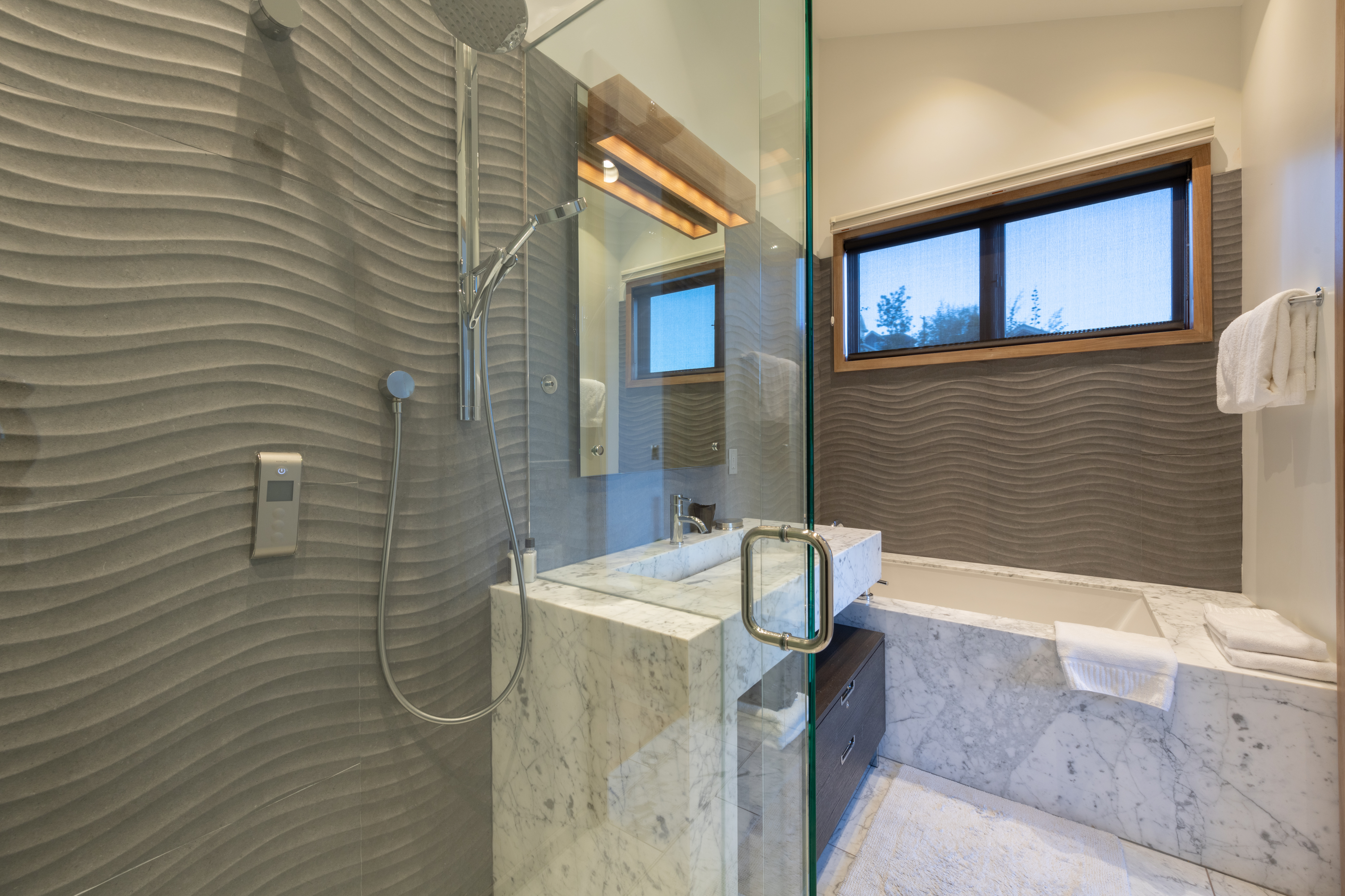 Luxurious master bath with stand-alone shower and over-sized soaking tub