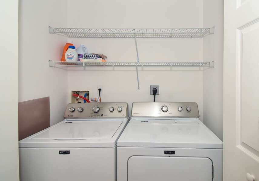 laundry room within this condo rental in new smyrna beach