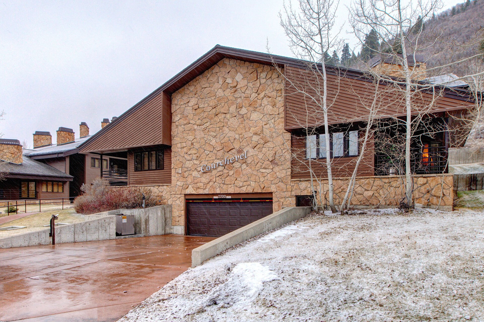 Street/Garage View of Courchevel Building