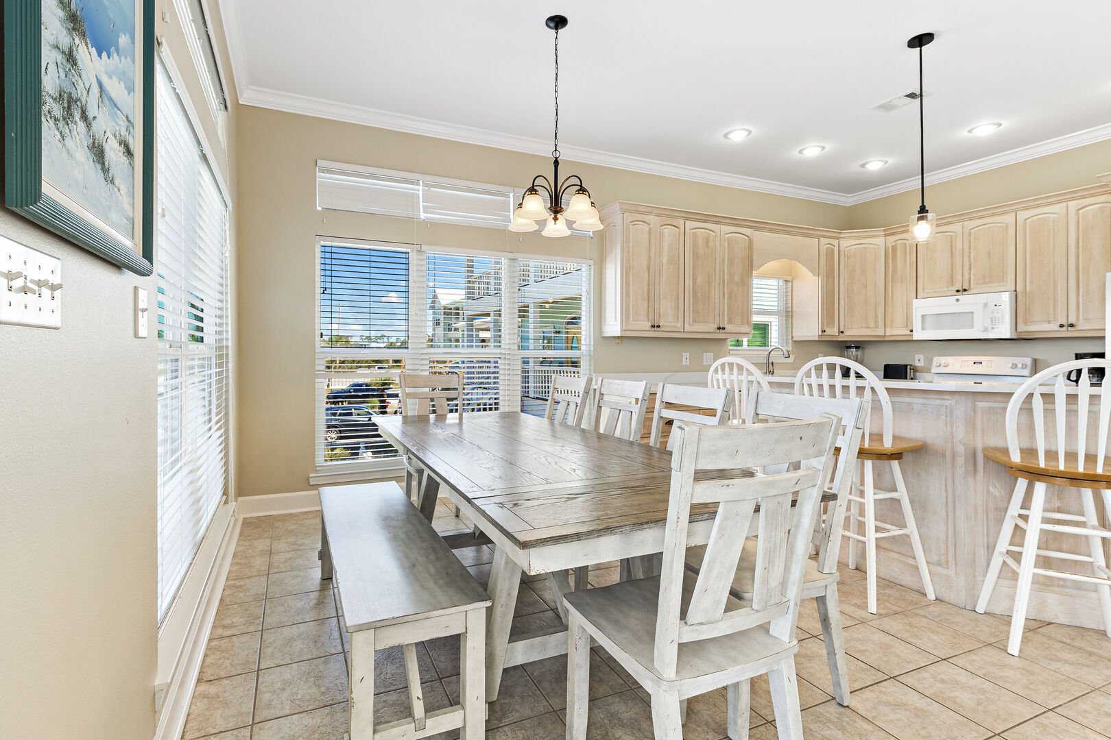 Open Plan Living Area with Dining Table that seats 6 and Extra Seating at the Breakfast Bar
