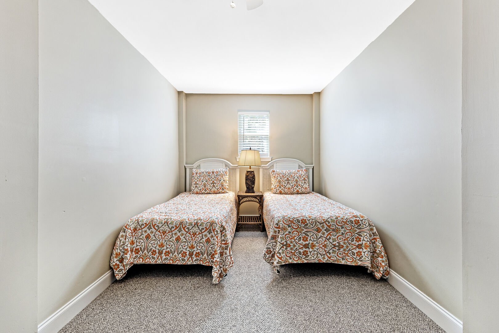 Guest Bedroom with 2 Twin Beds and Chaise with Full Guest Bathroom
