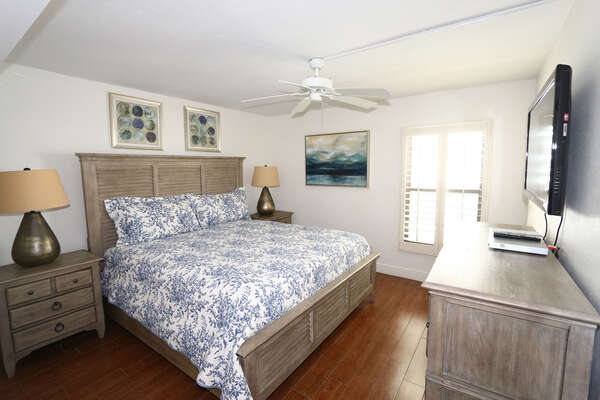 Master bedroom with a king bed