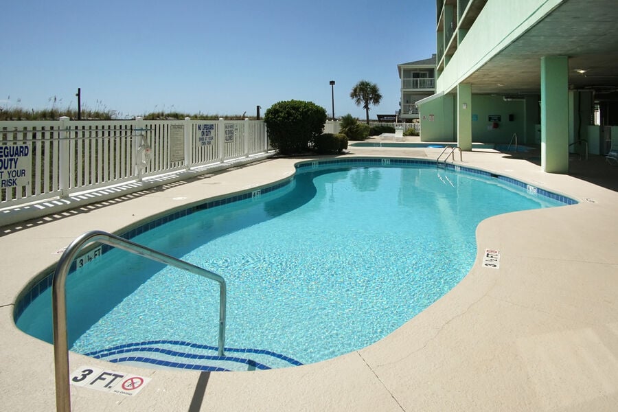 Paradise Pointe 12E - oceanfront condo in Cherry Grove Beach in North Myrtle Beach | pool view 1 | Thomas Beach Vacations