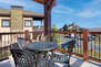 Gorgeous surrounding views from the upper level deck with seating for four and propane bbq