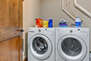 Lower Level Laundry Room with full-sized washer and dryer