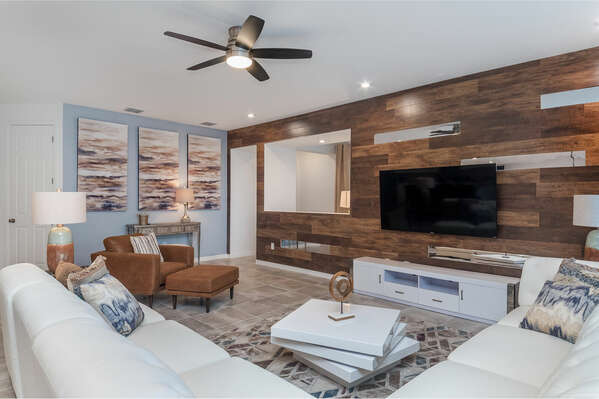 The living area offers ample seating for the family