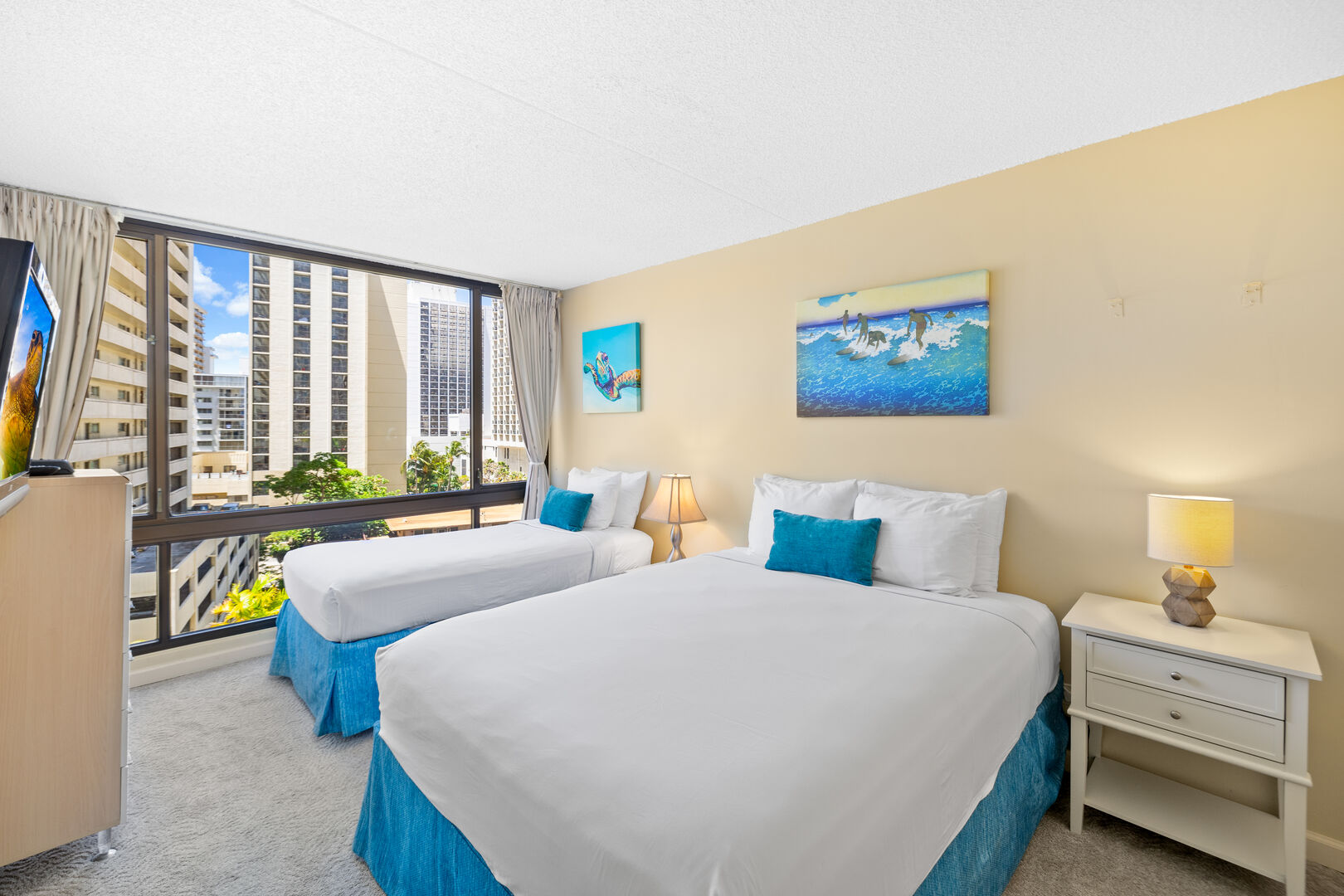 Relax in your bedroom with queen-size bed and twin-size bed, central AC, and TV!