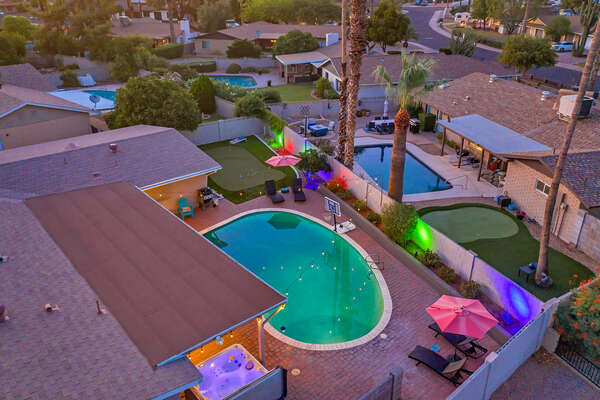 Private Backyard with Heated Pool and Hot Tub, Sitting and Lounge Areas and a Putting Green
