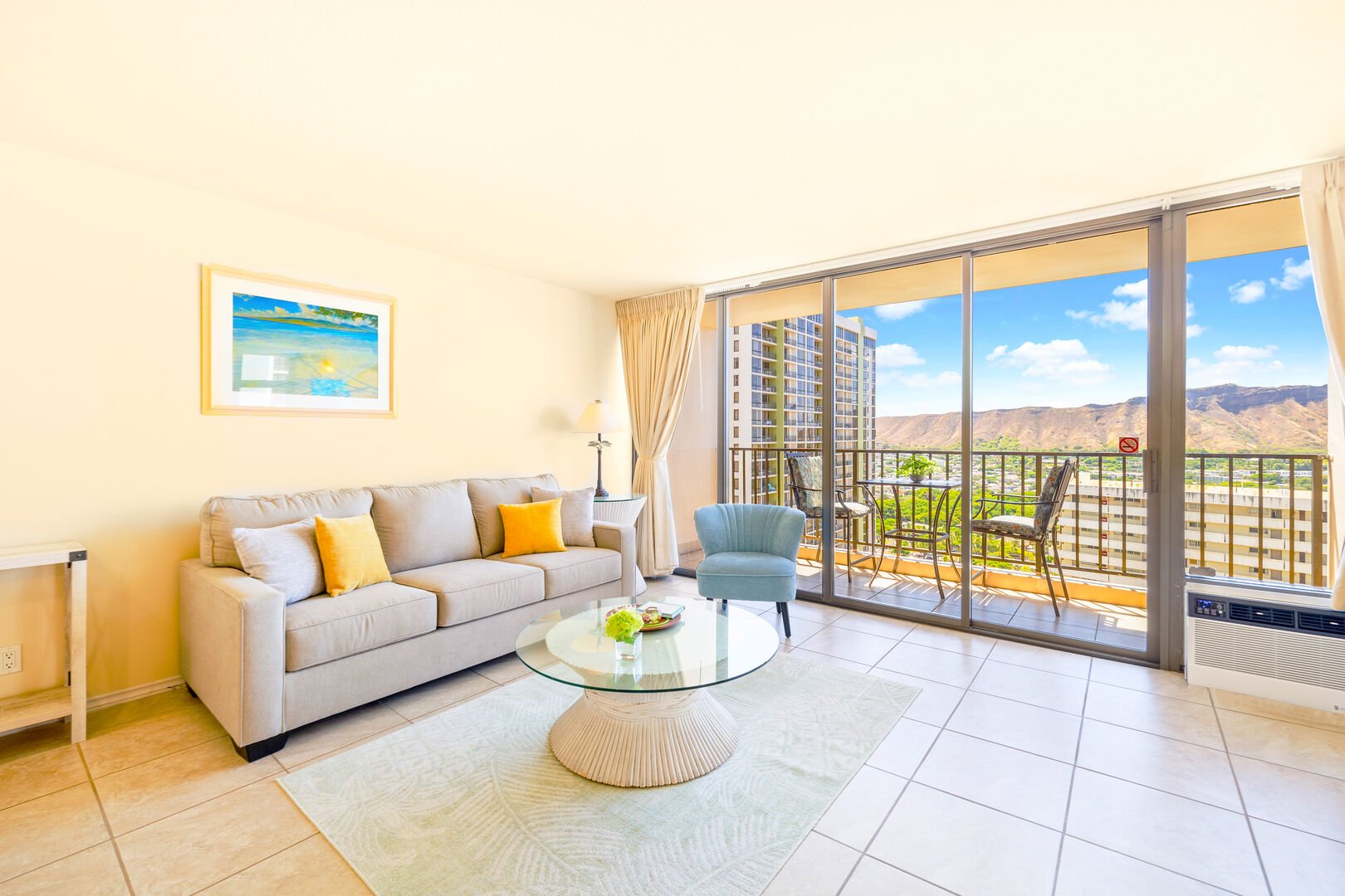 Enjoy the view of the Diamond Head mountain while resting on the new queen-size sleeper sofa in the living room!