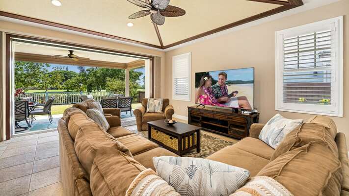 Comfortable sectional with 2 side chairs and ceiling fan