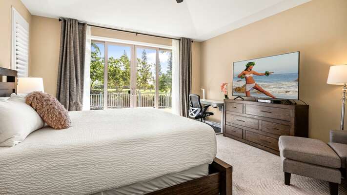 Main bedroom with King bed, TV and lanai access
