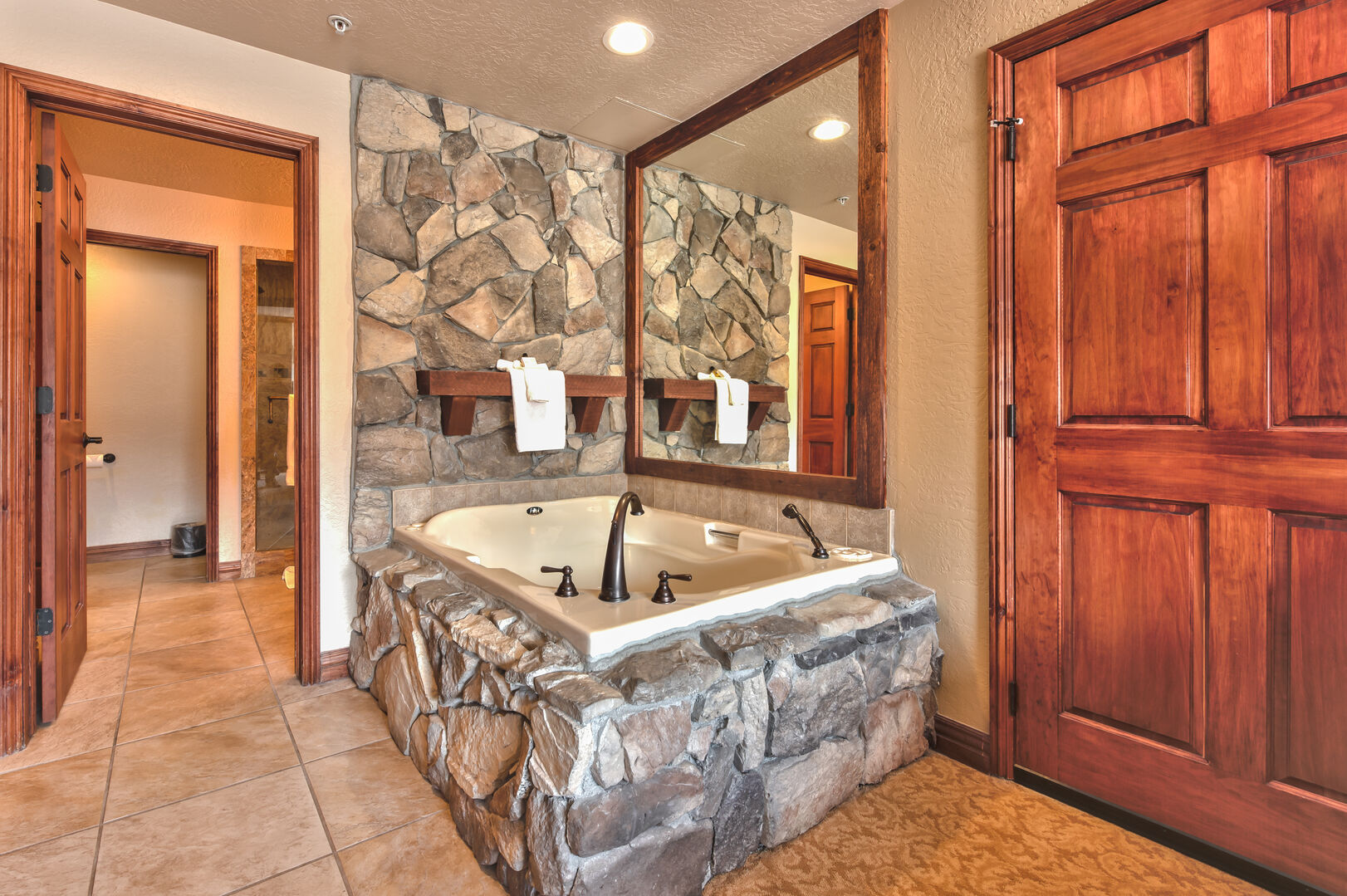 Master suite features a deep soaking jetted tub