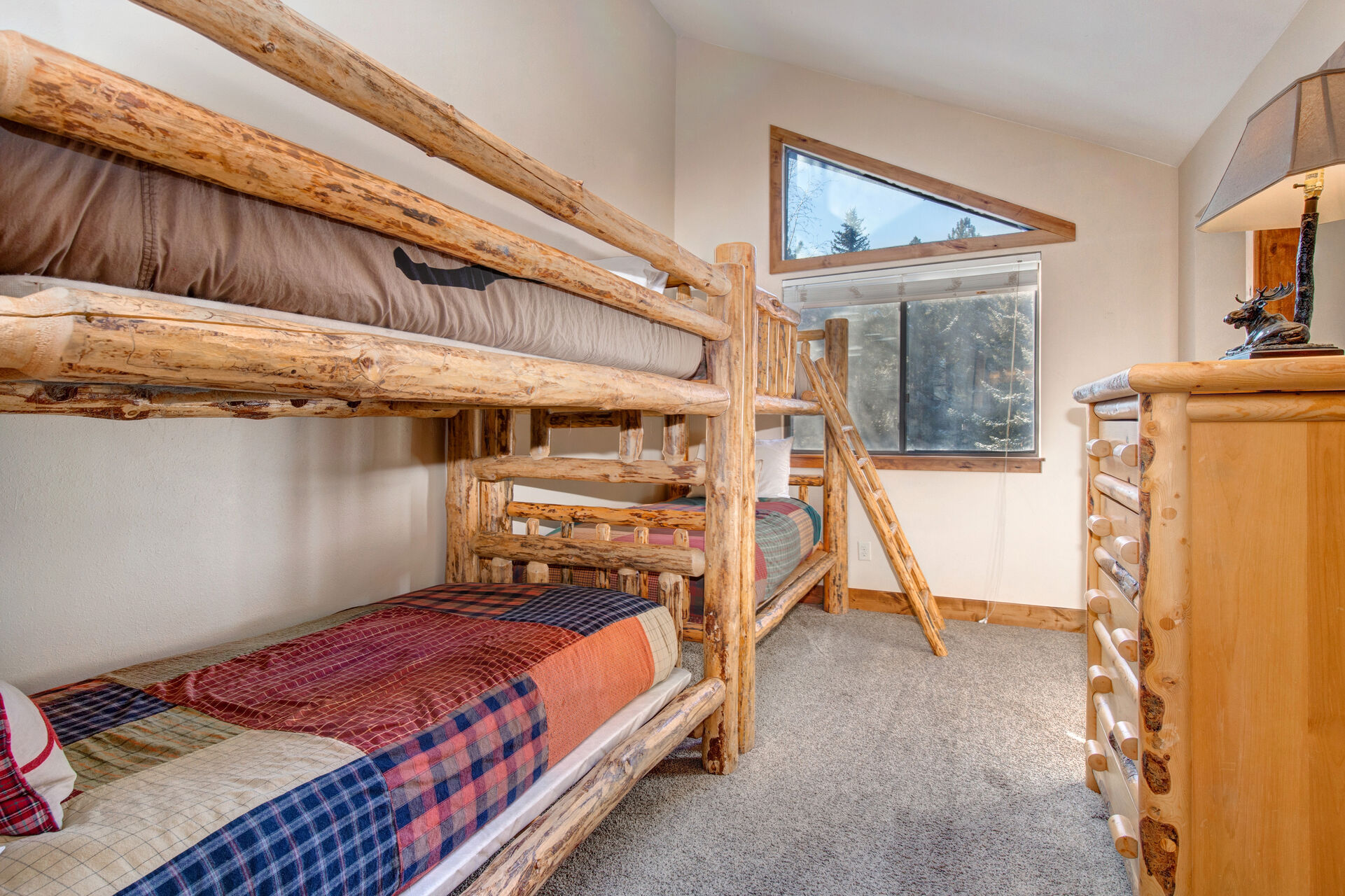 Upper Level Bedroom 2 with two twin over twin bunkbeds, and full bath access