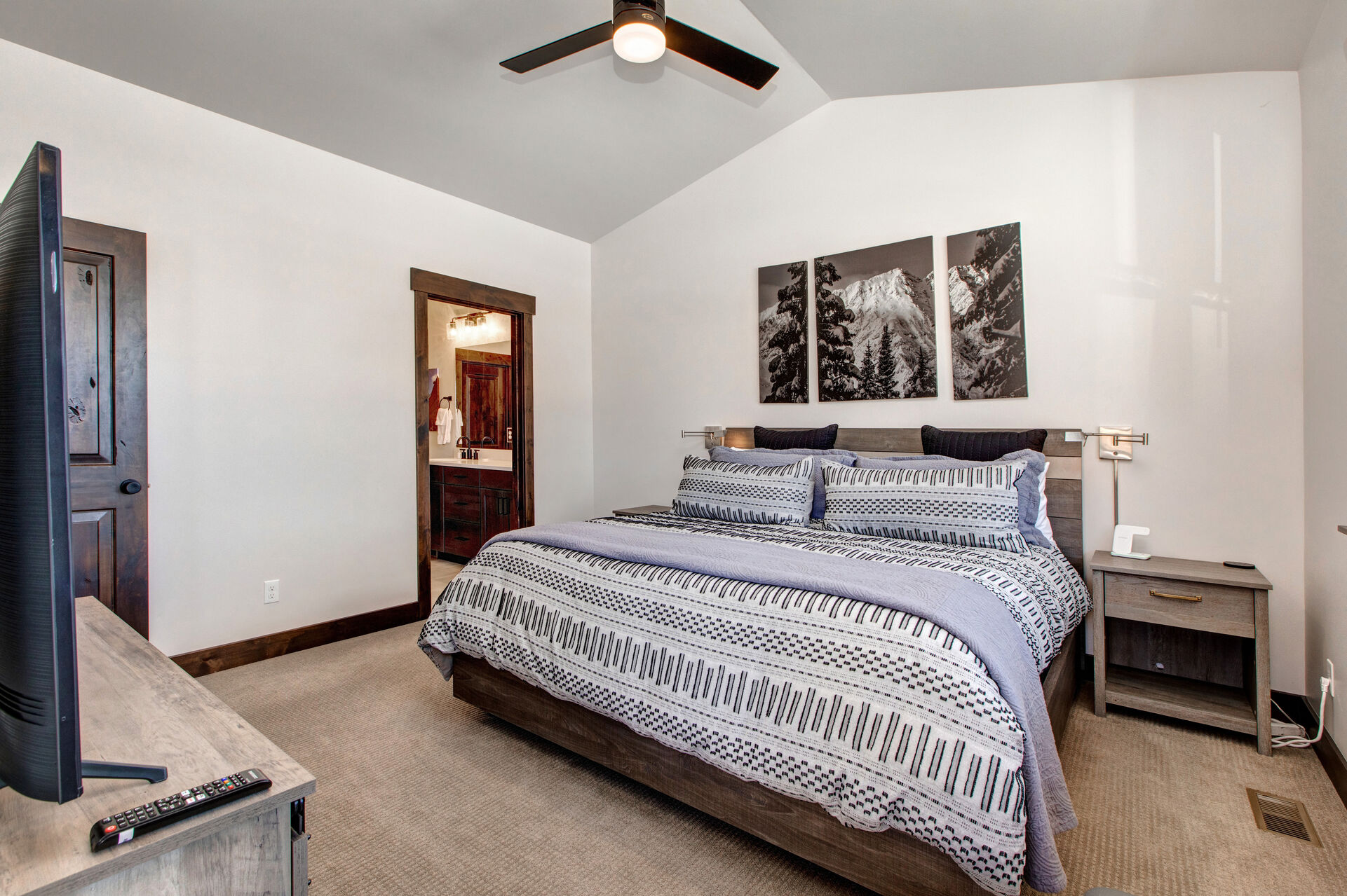 Main Level Master Bedroom with king sized Casper Wave Hybrid mattress, 55