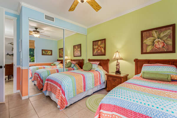 Bedroom with Twin Beds and Closet with Large Mirror at Waikoloa Hawaii Vacation Rentals