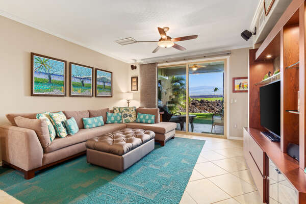 Living Room with Sectional Sofa, 3 Wall Paintings, and Views of the Golf Course