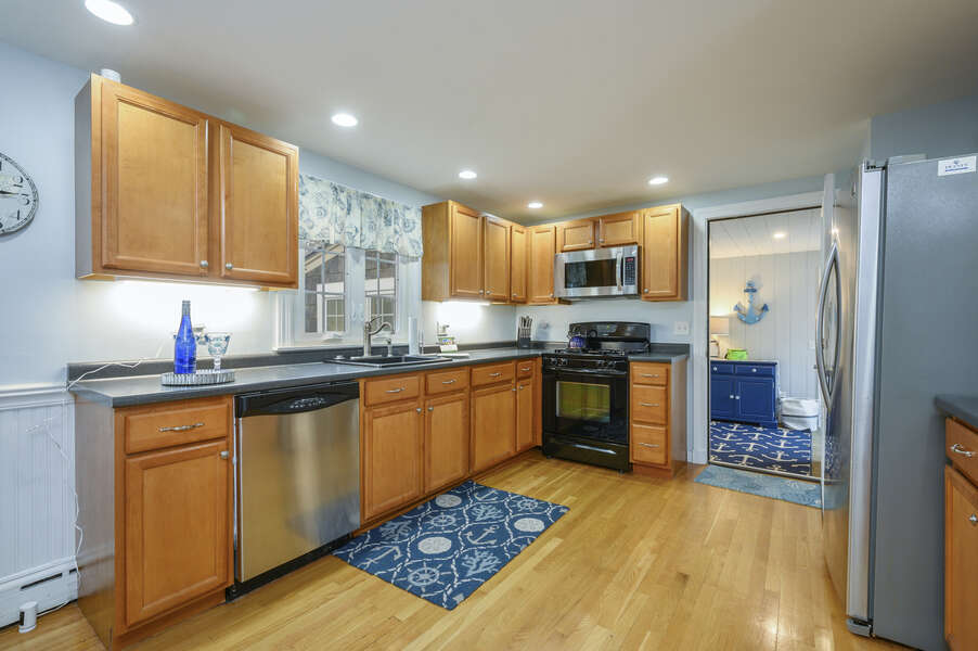 Large kitchen with stainless appliance and gas stove-50 Foster Road Hyannis Cape Cod- New England Vacation Rentals