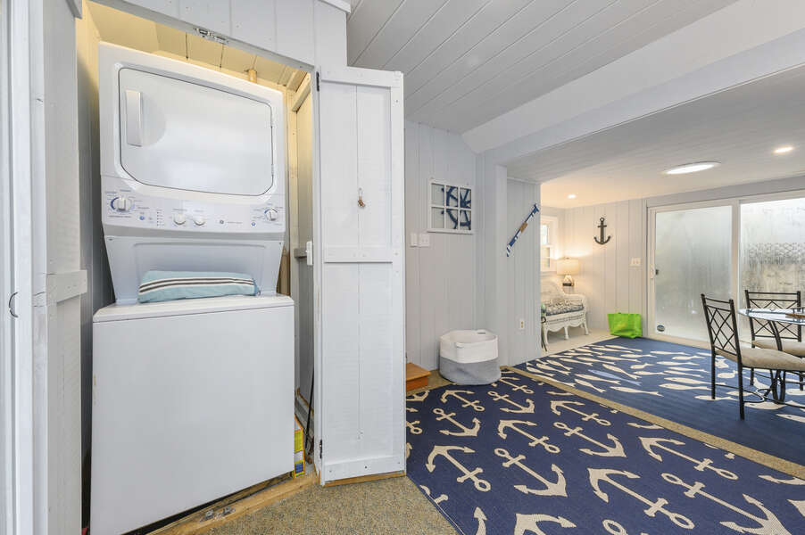 Stackable washer/dryer located in the sunroom- 50 Foster Road Hyannis Cape Cod- New England Vacation Rentals