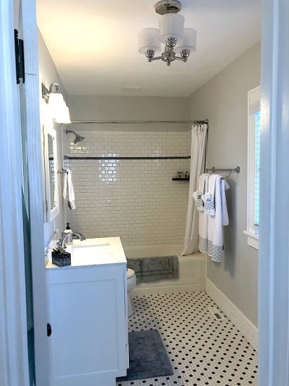 Crisp and clean main level Bath with tiled shower/tub combo