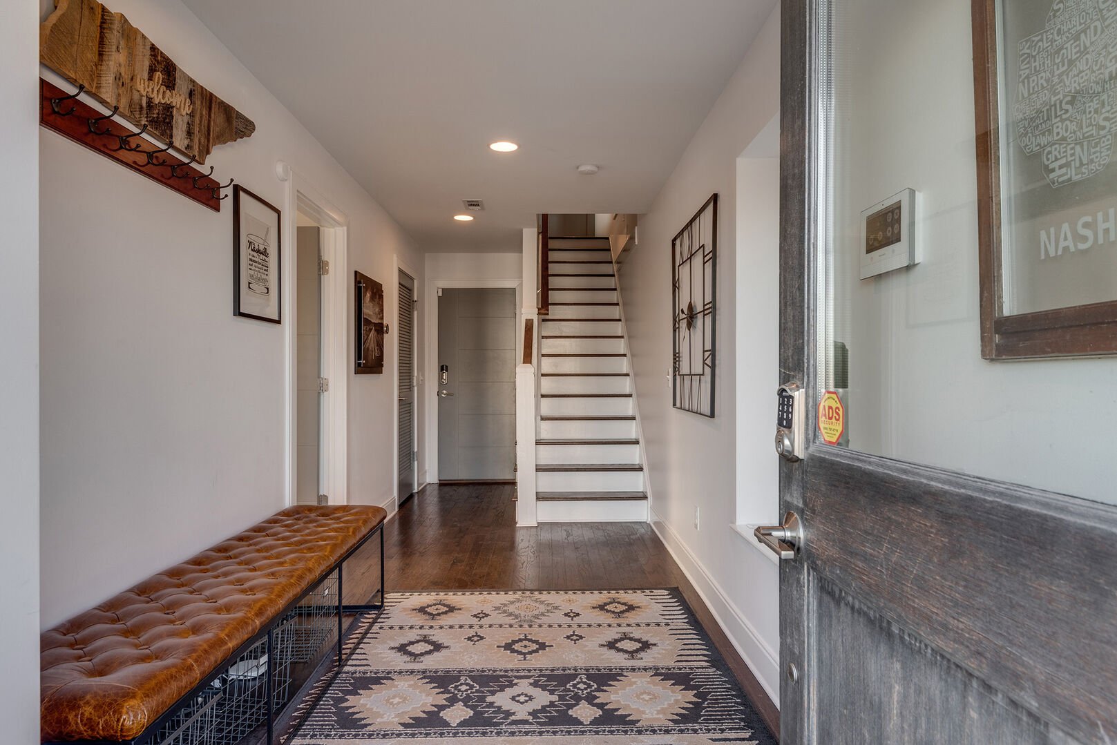 Entryway with access to 4th bedroom and parking garage
