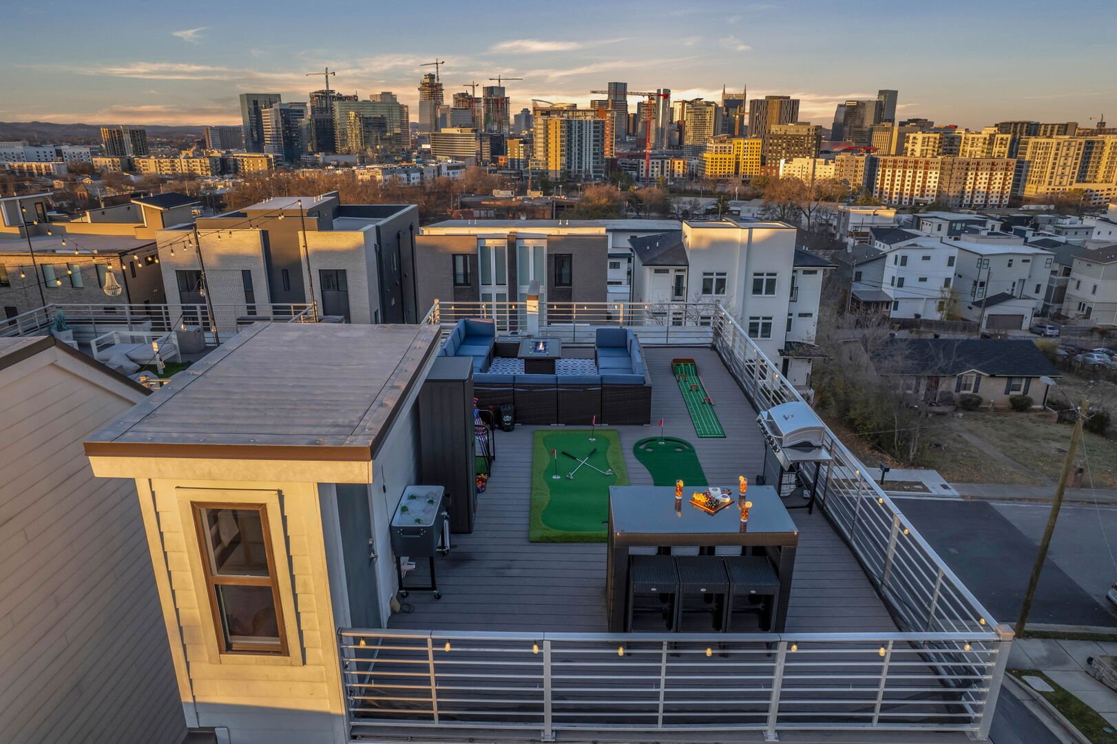 Private 600-square-foot outdoor deck and 360-degree views of Downtown Nashville with outdoor games, BBQ, cooler, plus outdoor seating.