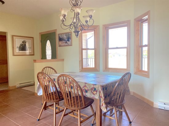 Dining room space with view of the front door