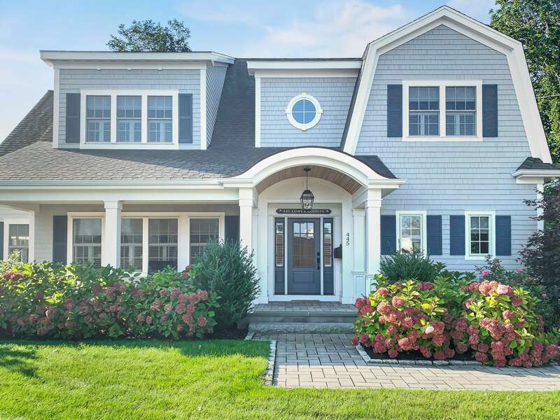 Welcome to Hangar Sea with Beautiful hydrangea framed front entry way -45 Lower County Rd Harwich- Cape Cod- New England Vacation Rentals.