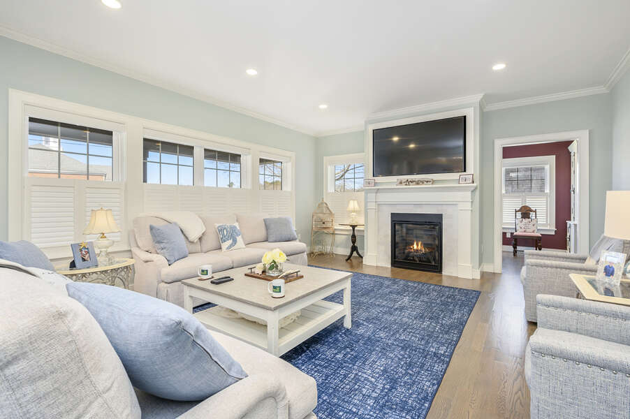 Living room with large flat screen tv ( fireplace is not for guest use) 445 Lower County Rd Harwich- Cape Cod- New England Vacation Rentals.
