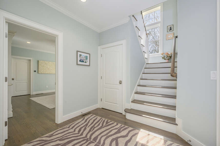 Entry to first floor bedroom and stairs to upper level #1-445 Lower County Rd Harwich- Cape Cod- New England Vacation Rentals.