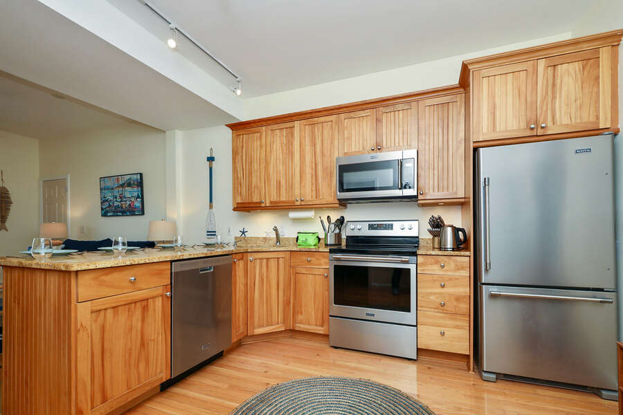 New stainless steel appliance in fully stocked kitchen - 25 Bank Street Unit #2 Harwich Port - New England Vacation Rentals- Harwich Port -Cape Cod- New England Vacation Rentals