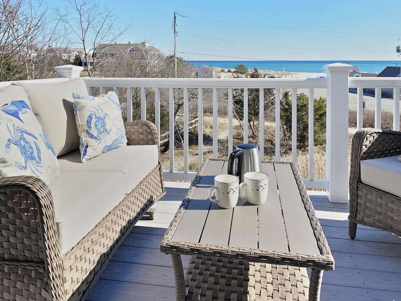 Comfy Seating and Views from the back deck - 25 Bank Street Unit #2 Harwich Port - New England Vacation Rentals- Harwich Port -Cape Cod- New England Vacation Rentals
