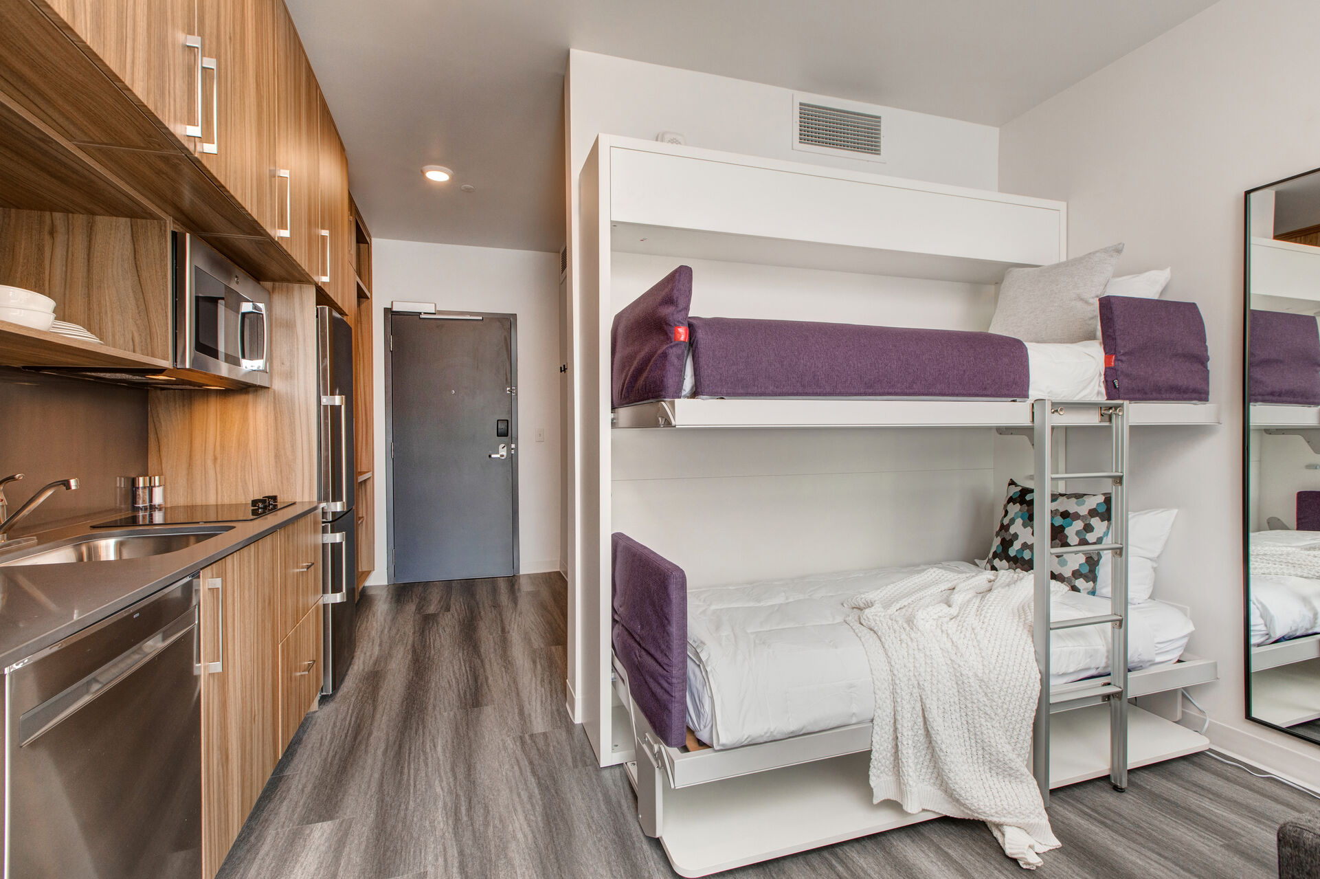 Two Twin Bunk Beds that Fold Out of the Wall
