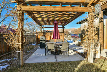 BBQ Grill and Outdoor Dining Set with Umbrella.