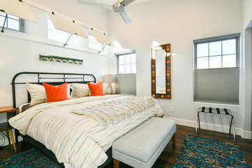 Large Bed, Nightstands, Table Lamps, Bed Bench, and Mirror.