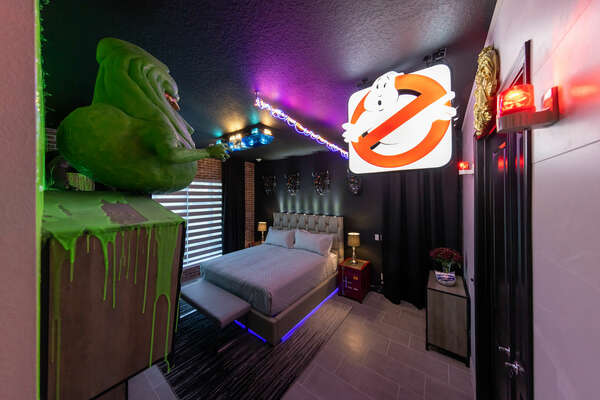 This ghostly themed bedroom features a king-size bed, a 65 inch 4k SMART TV, and has an en-suite bathroom