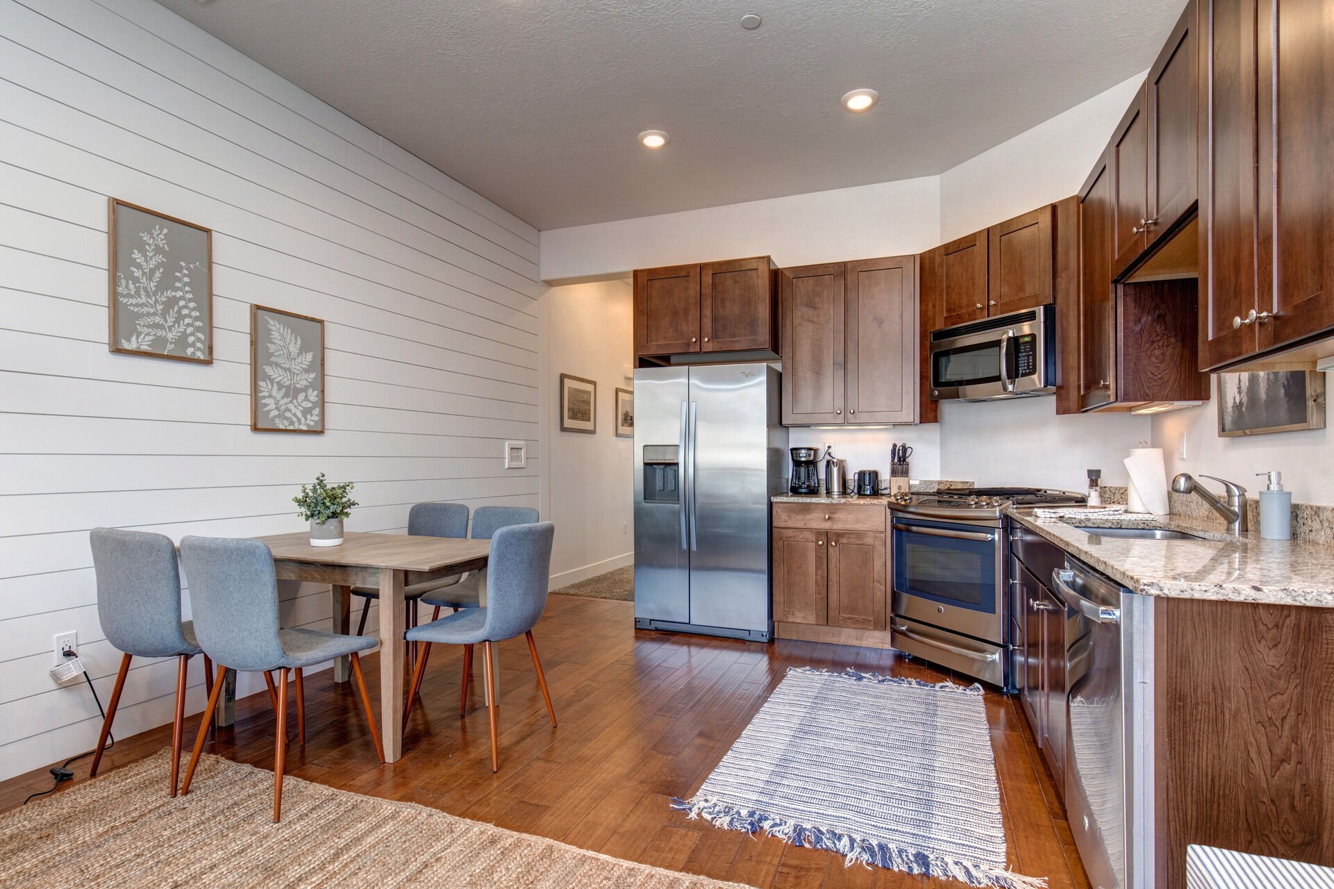 Fully Equipped Kitchen with stainless steel GE appliances, Whirlpool fridge with ice maker and water dispenser, and plenty of room to prepare any meal for those nights you just want to stay in
