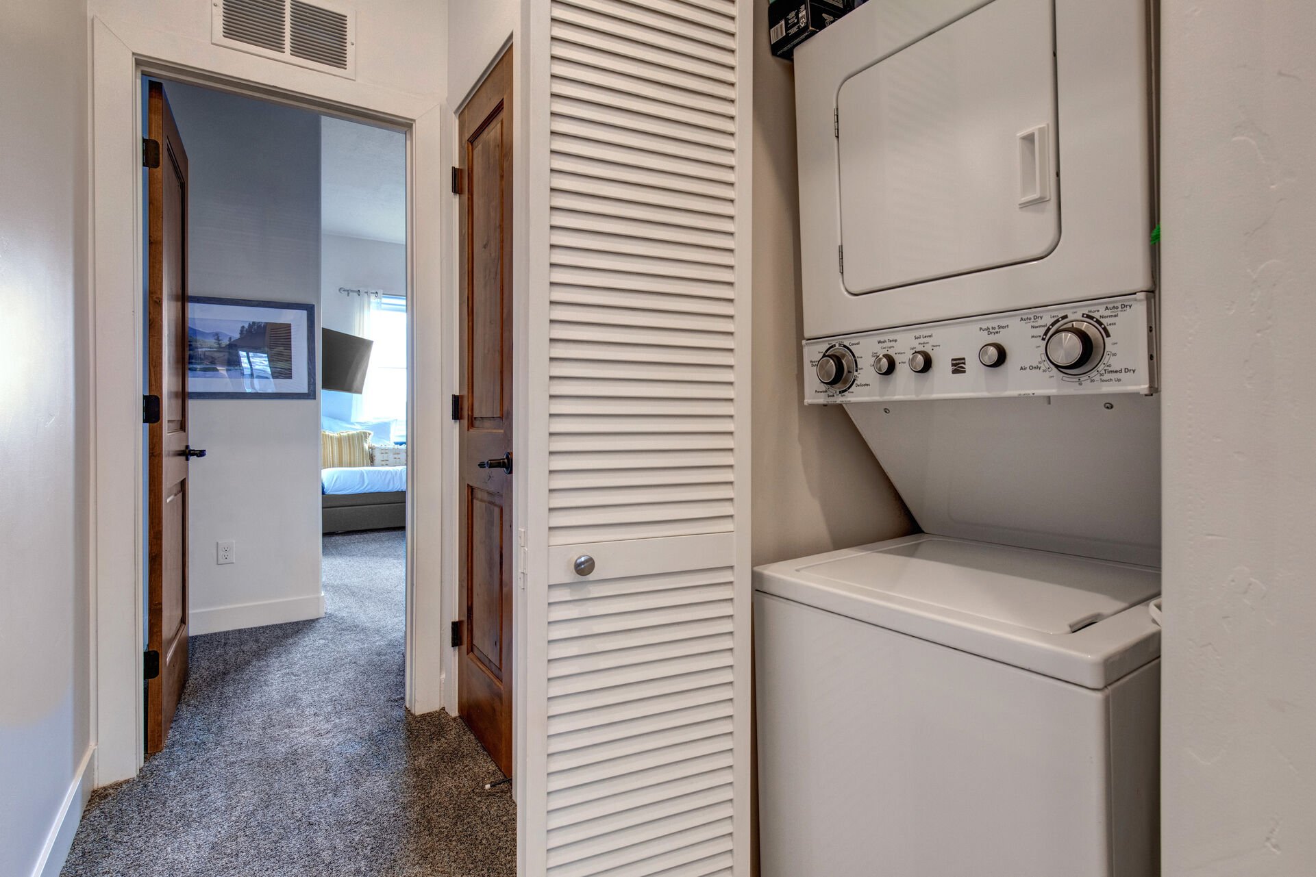Private Washer and Dryer units located in upper hallway closet