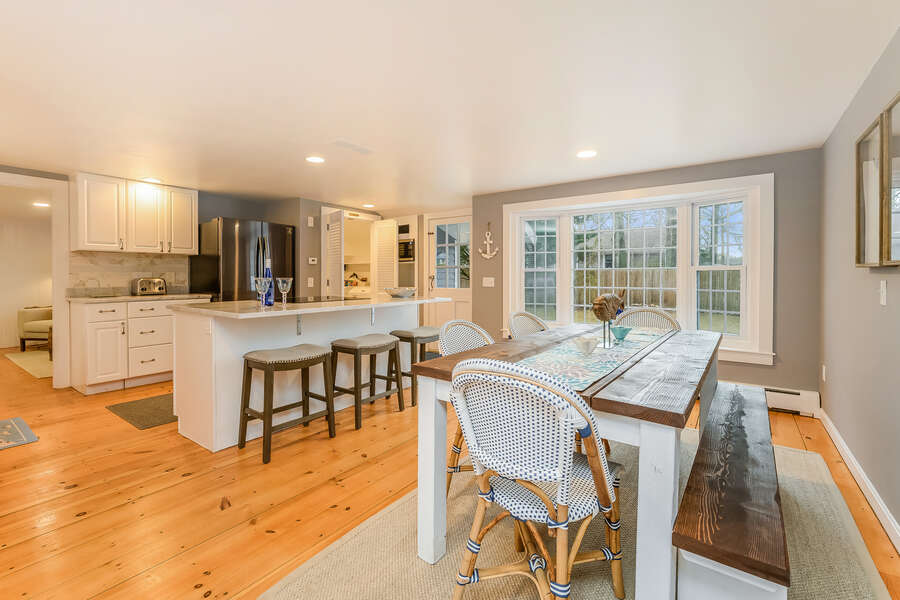 Chefs delight in this modern open concept kitchen / dining area with additional seating for 3 at the center island-75 Pinewood Rd Hyannis Cape Cod- New England Vacation Rentals