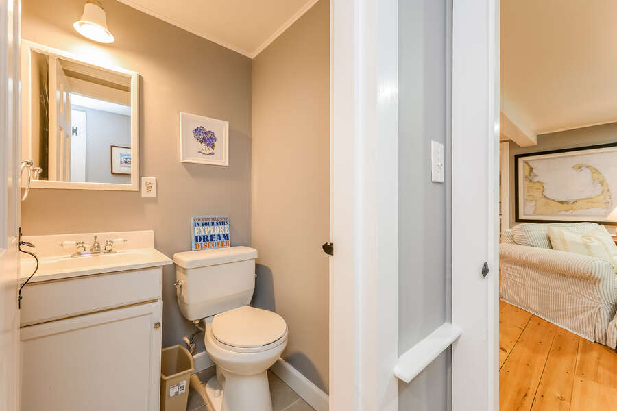 Bath #1 1/2 bath located in the hallway off the living room- 75 Pinewood Rd Hyannis Cape Cod- New England Vacation Rentals