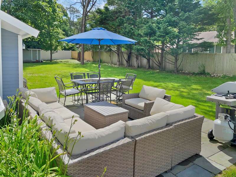 Patio and large fenced in backyard-75 Pinewood Rd Hyannis Cape Cod- New England Vacation Rentals
