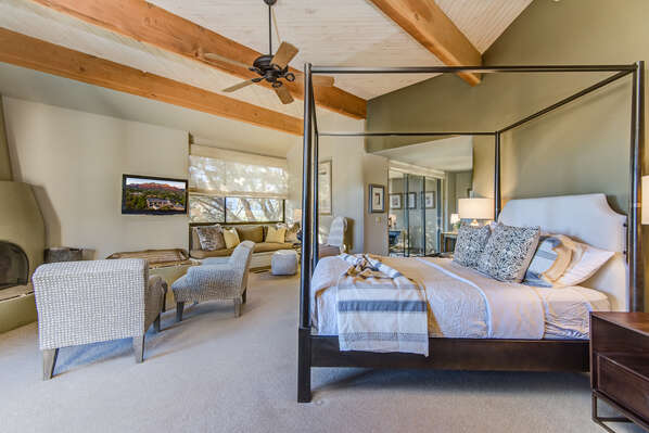 Grand Master Bedroom with a Queen Bed