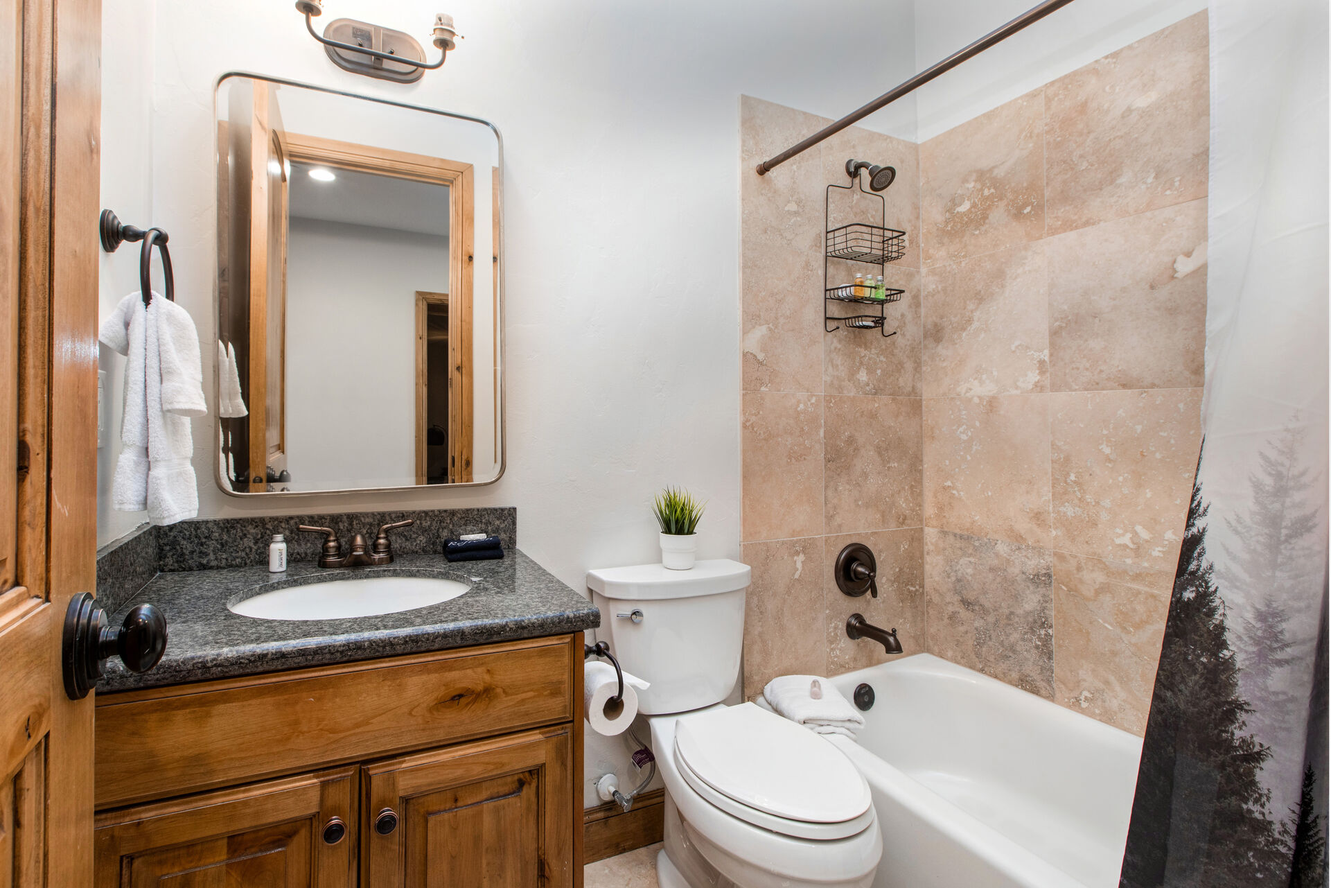 (2nd/Lower Level) Full Shared Bath 2 with a Tub/Shower Combo