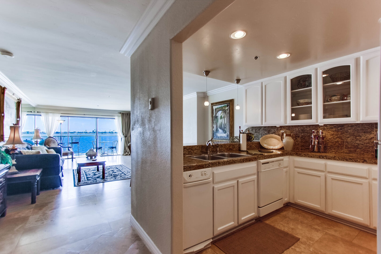 Fully equipped open kitchen to dining and living room with a view!