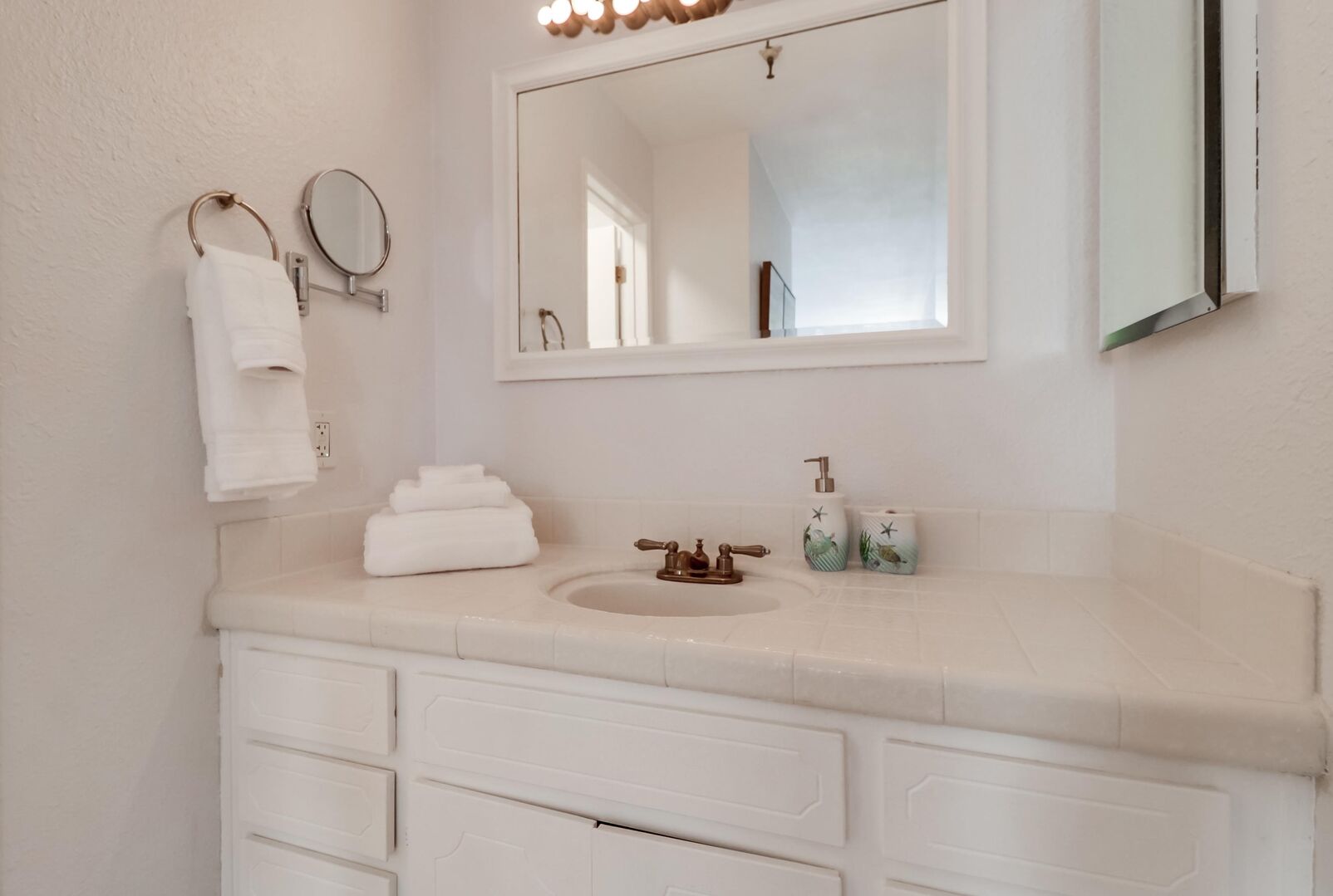 Master bathroom with large vanity, sink and ample drawer and cabinet space